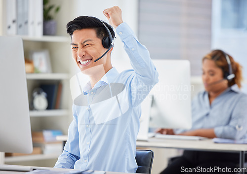 Image of Telemarketing, business man and success cheer of staff with good news and promotion email. Motivation, contact us and call center Asian employee with fist and winner gesture in office with support