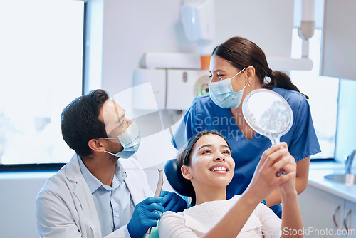 Image of Dentist, mirror and woman with smile for teeth whitening, braces and dental consultation. Healthcare, dentistry and happy female patient with orthodontist for oral hygiene, wellness and cleaning