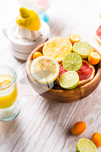 Image of Preparing refreshing summer drinks and lemonade with fruits and berries