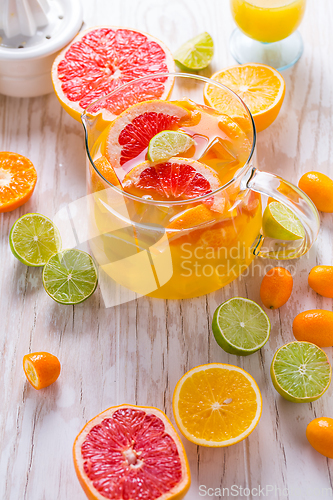 Image of Preparing refreshing summer drinks and lemonade with fruits and 