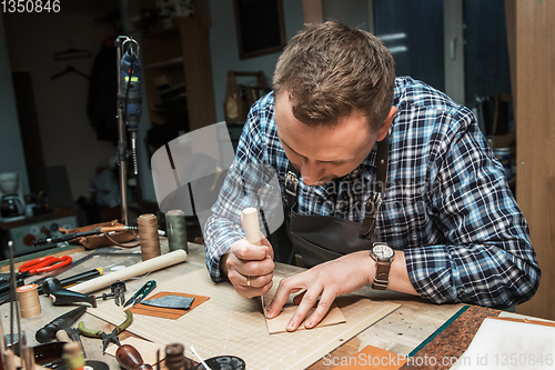 Image of Concept of handmade craft production of leather goods.