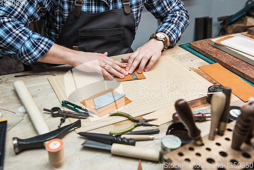 Image of Concept of handmade craft production of leather goods.