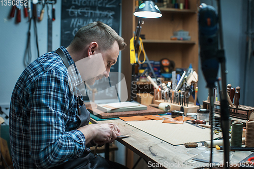 Image of Concept of handmade craft production of leather goods.