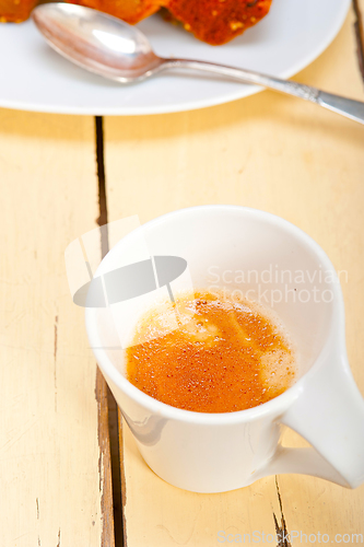 Image of plum cake and espresso coffee