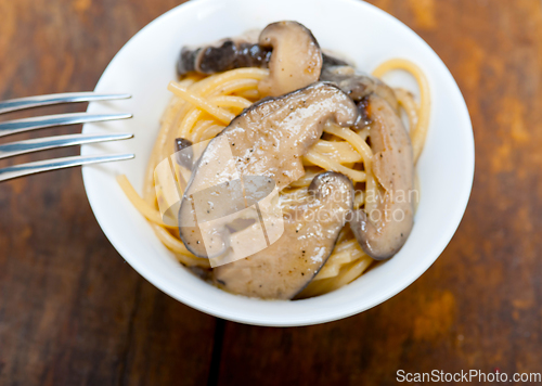 Image of Italian spaghetti pasta and mushrooms