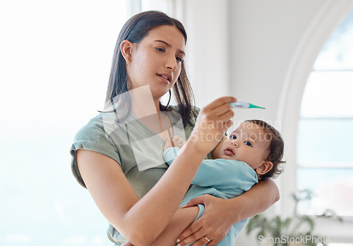 Image of Mom, sick baby and thermometer for medical risk, assessment results and flu infection at home. Mother testing temperature of infant kid, child and check for fever, virus and worried about health