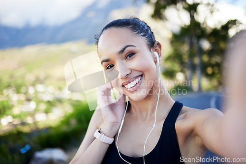 Image of Happy woman, fitness and portrait smile for selfie, photo or profile picture in social media or online post in nature. Female person, athlete or runner smiling for photo, memory or vlog outdoors