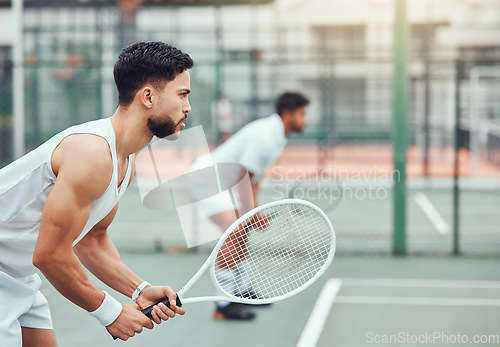 Image of Man, tennis and team is ready on a court for game and exercise with wellness in india. Male athlete, together and racket competition with fitness for a challenge with a workout in the outdoor.