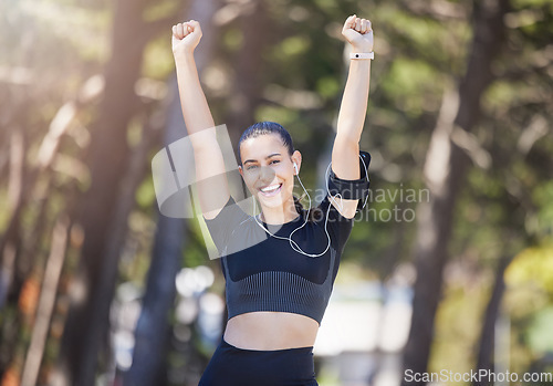 Image of Winner, runner or portrait of happy woman in park with hands in the air for winning celebration. Goal motivation, nature or excited sports girl in running training for achievement or fitness success