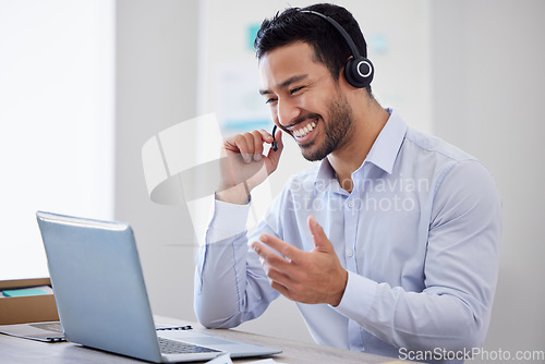 Image of Call center, laptop or happy man consulting on video call via headset in customer services help desk. Smile, telemarketing virtual assistant or funny Asian sales consultant laughing or talking online