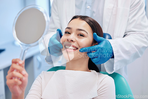 Image of Dentist, mirror and portrait of woman with smile after teeth whitening, service and dental care. Healthcare, dentistry and female patient with orthodontist for oral hygiene, wellness and cleaning