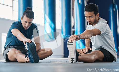 Image of Men, gym and legs stretching of friends before training, fitness and workout in health club. Warmup, athlete and man ready to start sport exercise together on the floor with personal trainer class