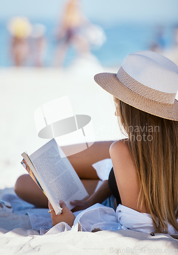 Image of Beach, reading a book and woman relax, summer vacation and getaway on a weekend break, peace and sand. Female person, reader and girl on a seaside holiday, tropical island and travel with literature
