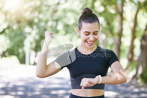 Image of Success happy woman or runner with smartwatch in park for heart rate to monitor training or exercise progress. Excited, yes or healthy sports athlete with timer celebrates running workout or fitness