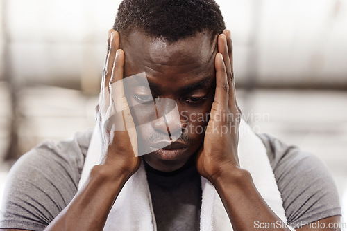 Image of Fitness, stress and black man with exercise, headache and workout with training, tired and fatigue. Male person, guy or athlete with mental health issue, anxiety or burnout with sports and frustrated