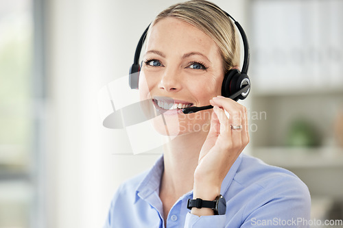 Image of Consultant, portrait of woman call center agent and with headset at her workplace office. Telemarketing or customer service, networking or support and female person happy for crm at workspace