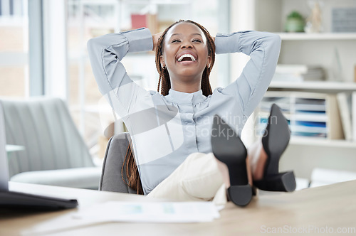 Image of Business, relax and black woman with feet on a desk, smile or achievement with confidence, career or professional. Female person, employee or consultant with completed task, rest and finished project