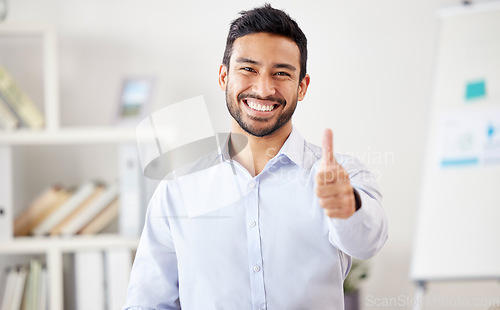 Image of Thank you, portrait of businessman with thumbs up and in office happy at his modern workplace. Success or achievement, motivation and cheerful male person with a hand emoji for support or deal