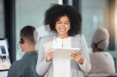 Image of Call center, tablet and business woman smile for customer service, support or telemarketing. Technology, sales agent and African female consultant working at help desk for crm, email and advisory app