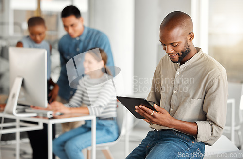 Image of Business tablet, smile and black man, designer or creative in office workplace. Touchscreen, technology and African male professional on email app, graphic design research or reading website online.