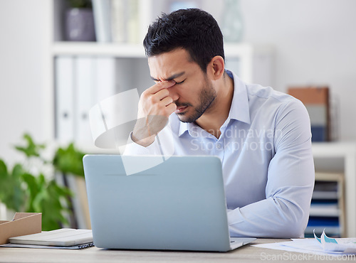 Image of Headache, laptop or businessman frustrated with financial crisis, stress or depression in office with fatigue. Burnout, migraine pain or depressed manager worried by mistake, tax risk or debt revenue