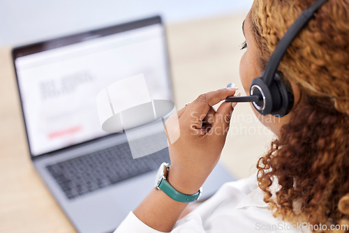 Image of Consultant, back view of call center agent with headset and laptop at her desk at workplace. Online communication or network, customer service or telemarketing and female person with crm at work