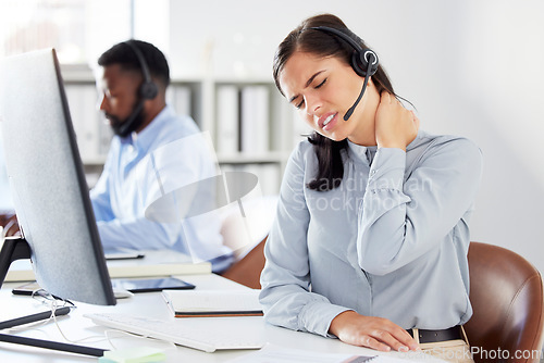 Image of Call center, neck pain and woman with injury in office, arthritis or fibromyalgia. Sales agent, spine problem and person with burnout, muscle fatigue and tired, stress and emergency after accident.