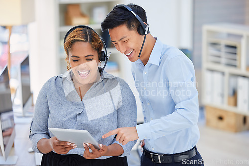 Image of Call center, man and woman with tablet, together and laugh at comic meme, funny video or social media. Young consultant team, digital touchscreen and customer service job for friends, blog and smile