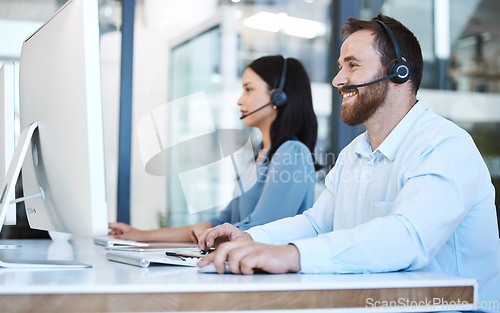 Image of Happy people, call center and team in customer service, support or telemarketing on computer at the office. Woman and man consultant, agent or virtual assistant working for online agency at workplace