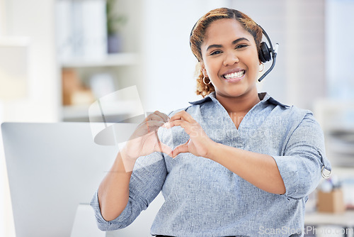 Image of Callcenter agent, woman with smile and heart hands in portrait, love customer service job and feedback. Hand gesture, care emoji and female consultant happy with job at contact center and support