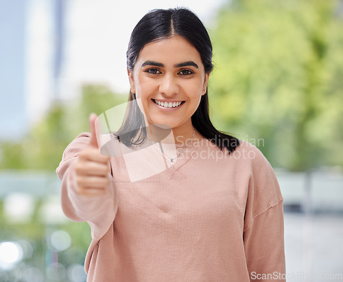 Image of Face, thumbs up and smile portrait of a woman in a house with sign for support, thank you or yes. Happy Indian female model person show hand or like emoji for success, trust and goals or good job
