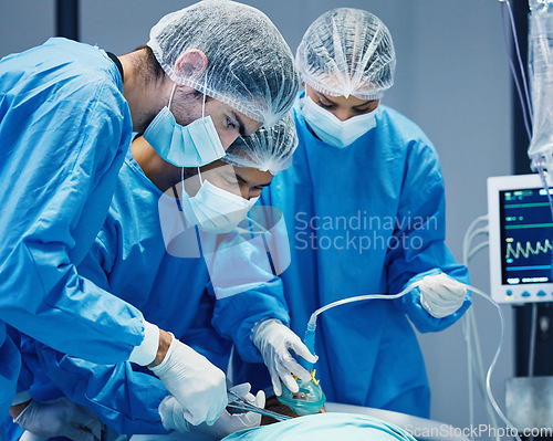 Image of Group of doctors in surgery, healthcare and surgical procedure start with PPE and team in theatre in hospital. Medical operation, health insurance and safety gear with surgeon people in clinic