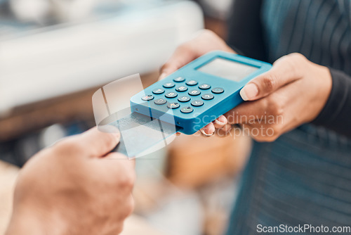 Image of Machine, card and hands paying in a store, cafe or restaurant for bill with technology. Contactless payment, electronic transaction and closeup of customer at a teller for point of sale or checkout.