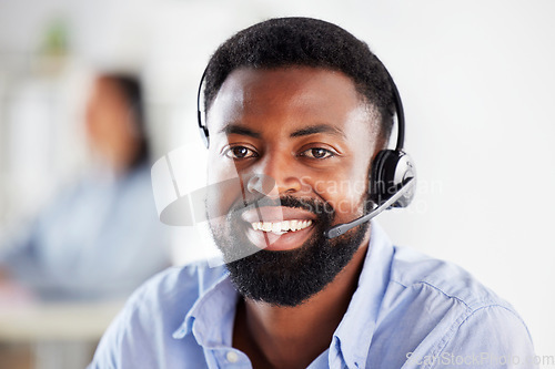 Image of Black man, call center portrait and smile in office for communication, tech support job or microphone. African guy, telemarketing and happy for sales consulting, customer service or help desk for crm