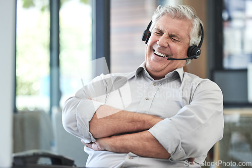 Image of Call center, customer support and man laugh in office for joke, humor and friendly sales service. Communication, telemarketing and happy senior male worker consulting with funny client contact