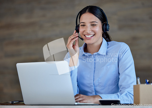 Image of Call center, happy and woman with headset working on crm, b2b or customer service job in communication on laptop. Businesswoman, telemarketing and support or professional worker to answer calls
