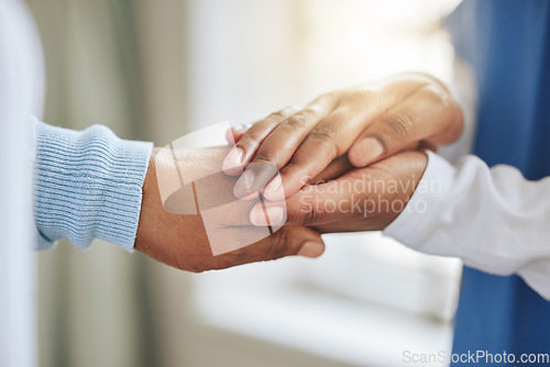 Image of Patient, nurse and holding hands for support, healthcare or empathy at nursing home. Medical worker and person together for trust, therapy and counseling or help for health or cancer results