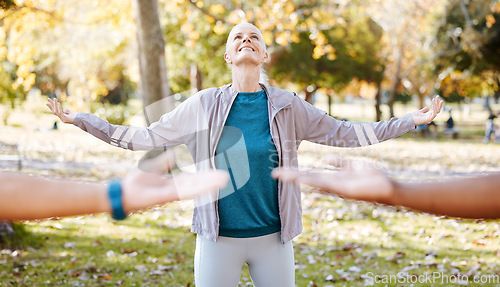 Image of Stretching, yoga and teacher with old woman in park for fitness, health and workout. Mindfulness, training and wellness with senior people and meditation in nature for pilates, balance and class