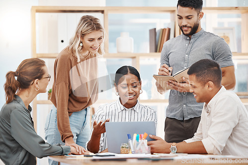 Image of Laptop, coaching and a business woman talking to her team in the boardroom for planning or strategy. Collaboration, meeting and presentation with a female employee training an employee group at work