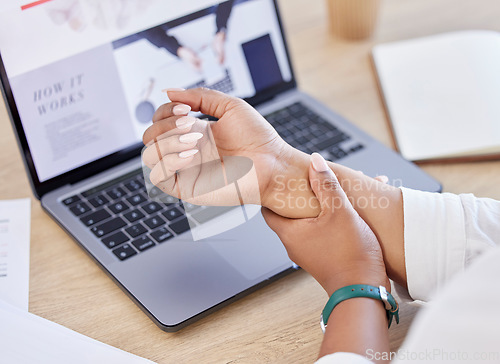 Image of Closeup, laptop and business person with wrist pain, muscle tension and health issue in a workplace. Hands, consultant and employee with a pc, medical problem, emergency and inflammation with strain