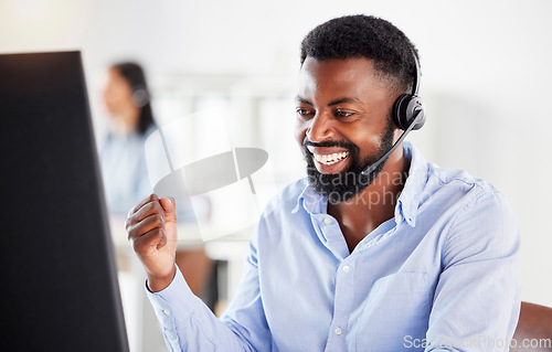 Image of African man, call center and fist celebration with smile, win or success with profit, bonus or promotion. Young black consultant, winner and goals in telemarketing office on fintech, stock or trading