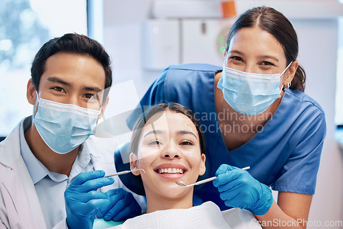 Image of Portrait of dentist and woman in consultation for teeth whitening, service and dental care. Healthcare, dentistry and orthodontist with equipment for patient for oral hygiene, wellness and cleaning