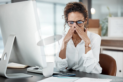 Image of Business woman with headache, stress and burnout with pain, mental health and professional crisis at office. Problem in workplace, mistake and female employee is frustrated with migraine and anxiety