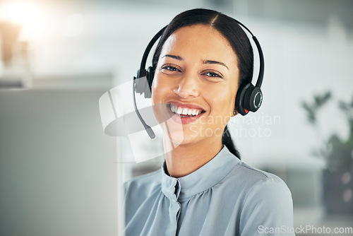 Image of Call center, headset and portrait of a happy woman at computer for customer service or sales. Smile on face of consultant person at a pc for telemarketing, crm or help desk and contact us support