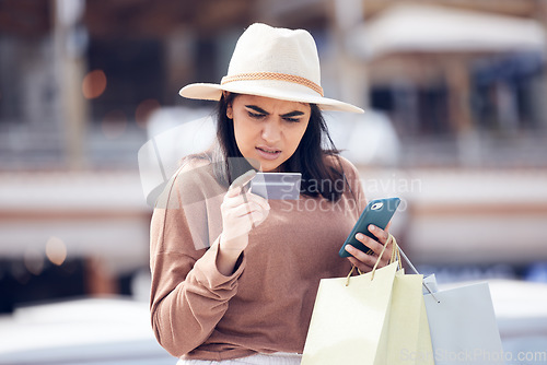 Image of City, smartphone and woman with a credit card, confused and scam with payment, wrong password and shopping bags. Female person, fraud and customer with a cellphone, glitch and error with banking