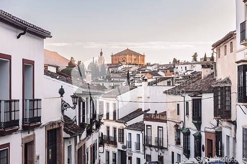 Image of Views of the medieval village of Ronda with white Andalusian houses and the gothic style church of Santuario de Maria Auxiliadora. Malaga, Spain.