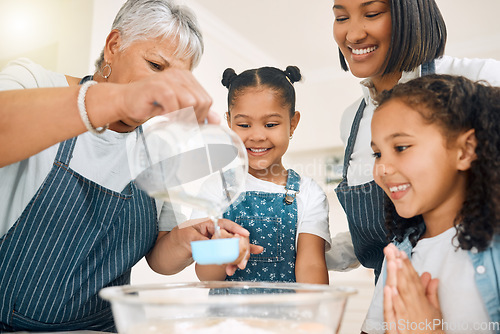 Image of Grandmother, mom or happy children baking in kitchen as a happy family with siblings learning cookies recipe. Mixing cake, development or grandma smiling or teaching excited kids to bake with flour