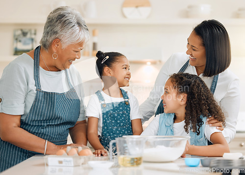 Image of Grandmother, mom or happy kids baking in kitchen in a family home with siblings learning cooking skills. Cake, woman laughing or grandma smiling, talking or teaching young children to bake together