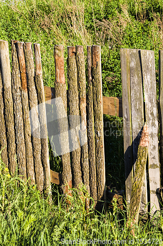 Image of old primitive low fence, Eastern Europe