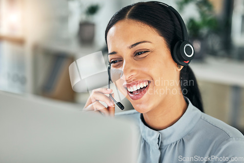 Image of Call center, face and a happy woman with a microphone at computer for customer service or sales. Smile of a person talking at a pc with a headset as telemarketing, crm support or help desk consultant